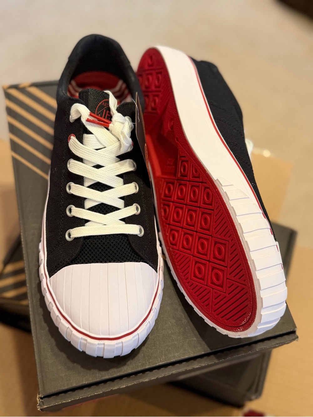 Black & White Low-Top Sneakers with Red Outsole - Unbranded